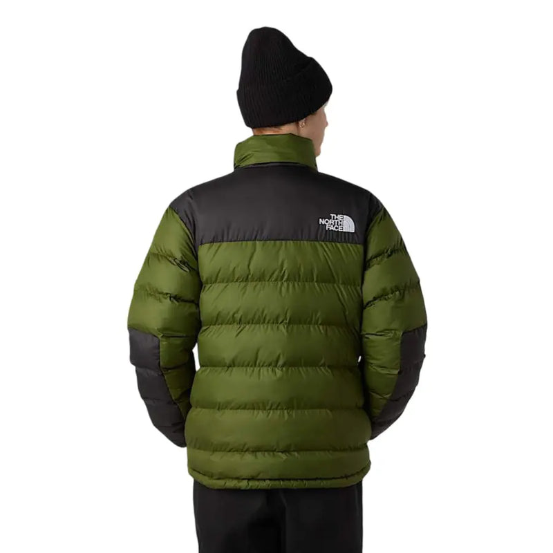 Green and black down jacket with the north face logo.