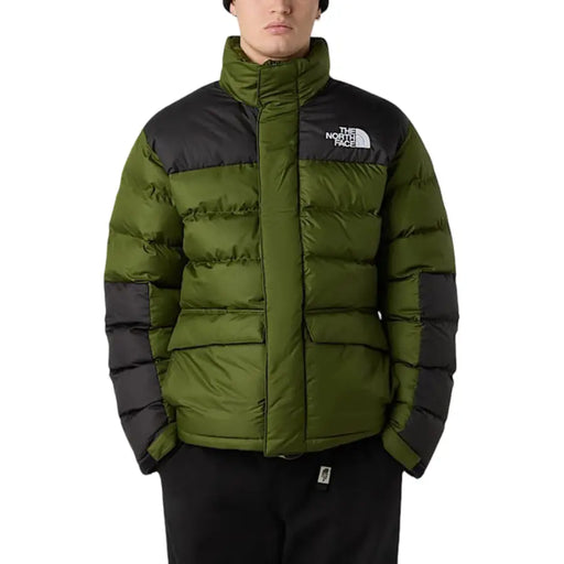 Green and black puffer jacket with the north face logo.