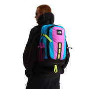 The north face men hot shot se purple nylon rucksack in vibrant cyan and pink with neon yellow accents