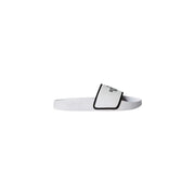 White slide sandal with black trim and minimalist logo on polyester strap from the north face men slippers white logo print