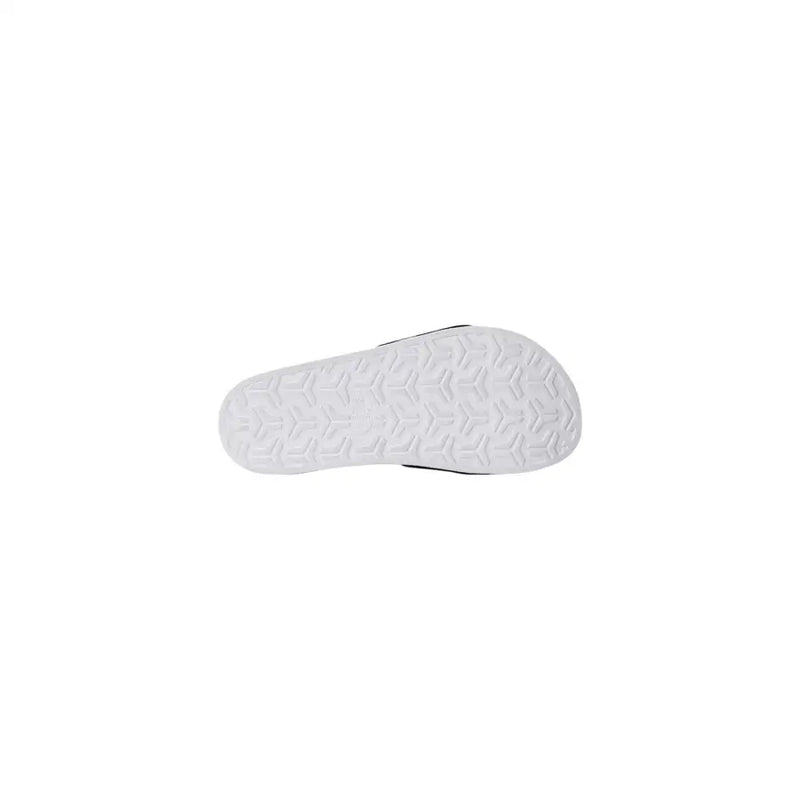 The north face men slippers with white logo print feature a white rubber sole with geometric tread and black trim