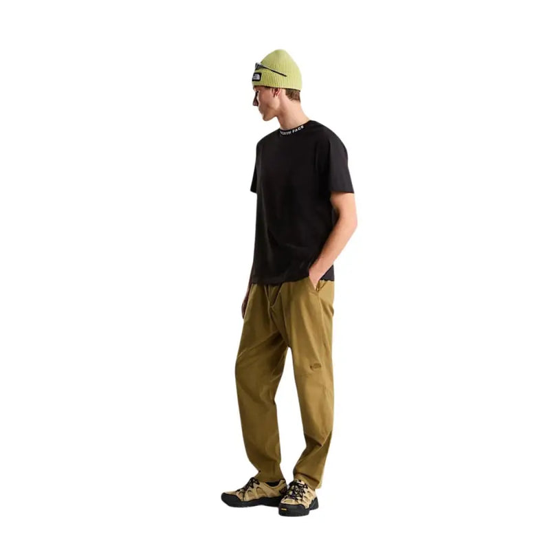 Black short-sleeved cotton t-shirt for men with The North Face logo around the neckline by The North Face