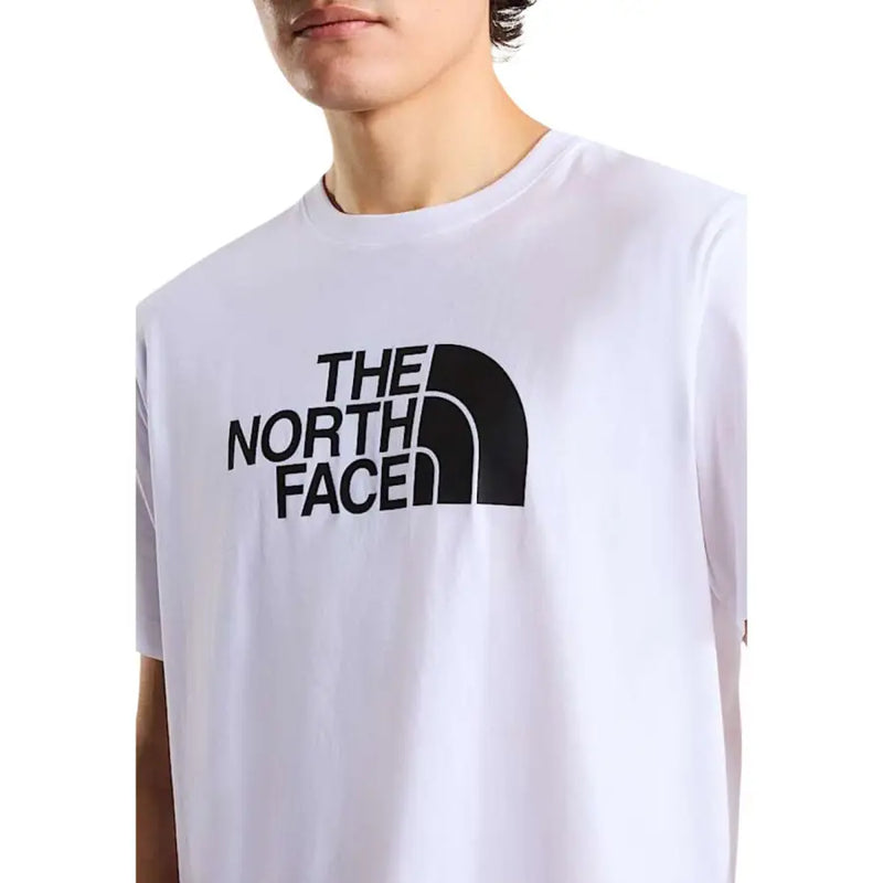 White the north face men t-shirt featuring a bold black half-dome logo on cotton fabric for casual wear
