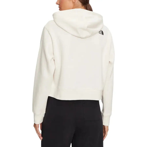 Cream-colored The North Face women’s cropped fleece hoodie with back logo