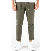 Lyle & Scott Men Trousers olive green tapered pants with drawstring waist and white sneakers