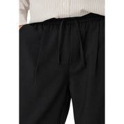 Only and Sons men black drawstring trousers in viscose blend with relaxed tapered fit and subtle front pleats