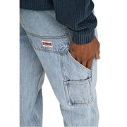 Back side of light-wash blue only and sons men jeans in 100% cotton with rugged utilitarian design and branded label