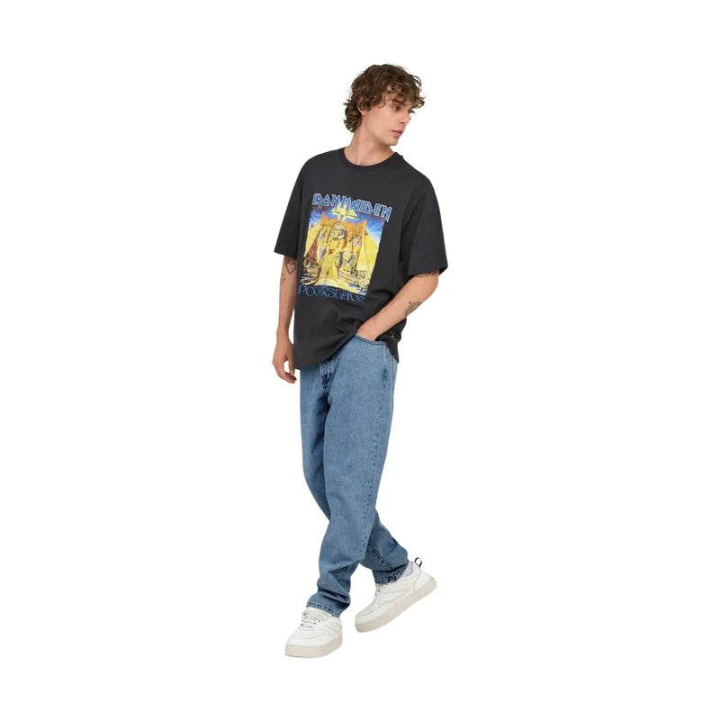 Black iron maiden powerslave band t-shirt with colorful graphic print paired with only and sons men light blue cotton jeans