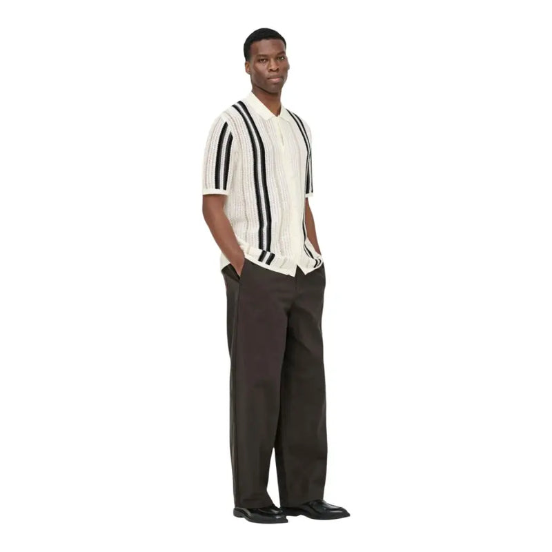 Cream-colored only and sons men polo shirt with bold black vertical stripes made of cotton knit fabric