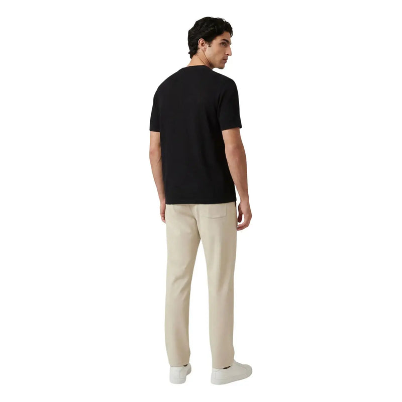 Only & Sons men trousers featuring a black short-sleeved t-shirt with a simple crew neck and fitted smooth fabric