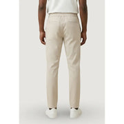 Beige slim-fit trousers with elastic waistband and two back pockets shown from the back by Only & Sons Men Trousers