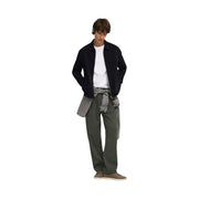 Only and Sons mens black polyester regular fit blazer with classic collar and two front pockets worn over white tee