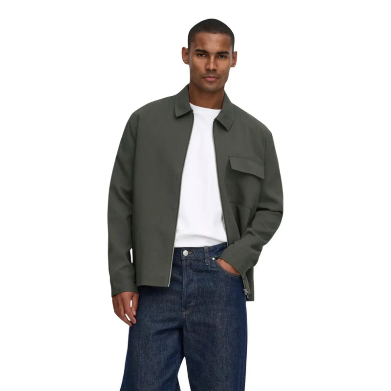 Olive green utility jacket with single chest pocket and zipper closure paired with only and sons mens black polyester blazer