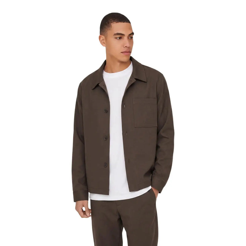 Olive green utility jacket by only and sons with button closure and chest pocket in regular fit style