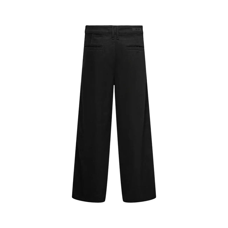 Only Jean Remi noir pour femme, coupe large, avec poches avant discrètes et jambes larges (vue de face).