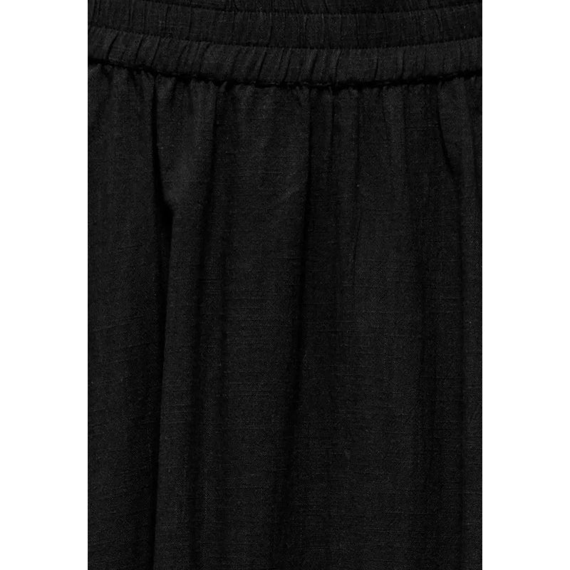 Black cotton linen skirt for women featuring an elastic waistband ideal for casual summer apparel