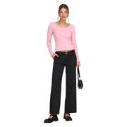 A soft pink long-sleeved crop top with rounded neckline and ruffled hem paired with only women black cotton trousers with zip hook pockets size 30