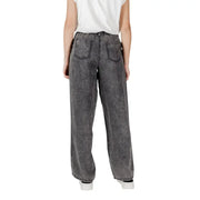 Wide-leg gray denim only women black lyocell jeans with faded distressed texture and classic back pockets shown from back side