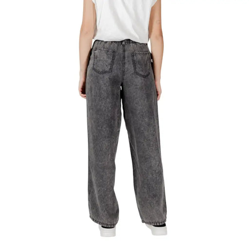 Back view of Only wide-leg gray denim jeans with faded distressed texture