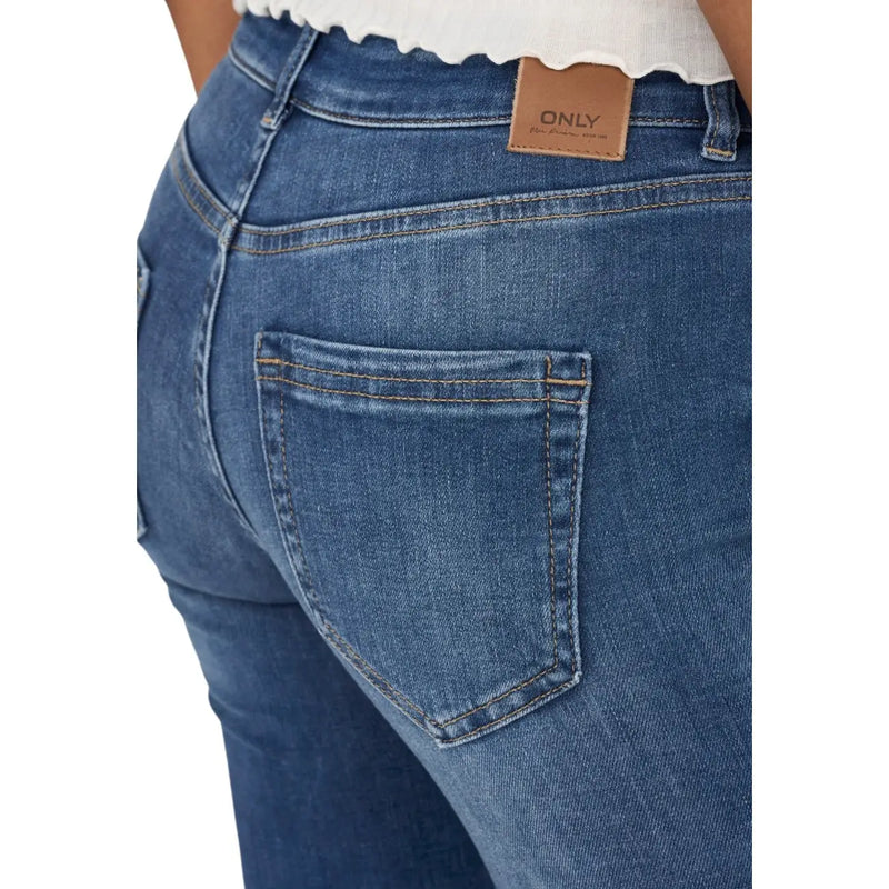 Blue denim jeans for women with a brown leather only brand patch on the waistband made from cotton blend fabric