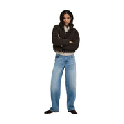A pair of light-wash wide-leg denim jeans with relaxed fit and classic stitching for women by only with brown corduroy puffer blazer polyester
