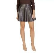 A sleek high-waisted mini skirt in shiny charcoal gray faux leather with a flared silhouette for fall winter