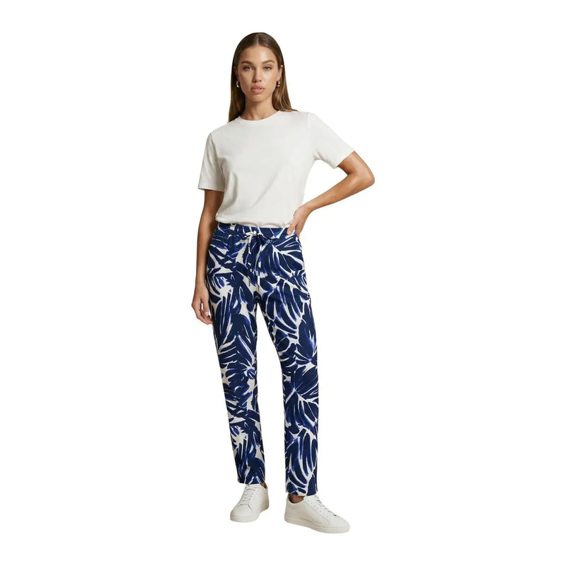 Only women floral blue viscose trousers with blue and white tropical leaf pattern and front pockets