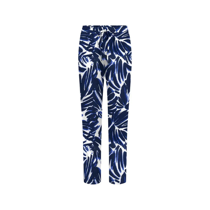 Blue and white tropical leaf patterned viscose drawstring trousers with front pockets by only women