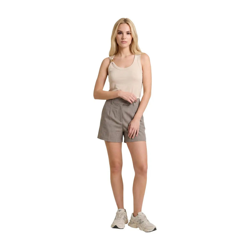 Beige sleeveless top with a soft fitted silhouette and subtle scoop neckline paired with only women grey polyester tailored shorts