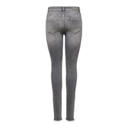 Only Graue Damen-Jeans aus Stretch-Baumwolle, von hinten gesehen, schmal geschnitten, verwaschene Farbe, ausgefranster Saum und klassische Taschen.