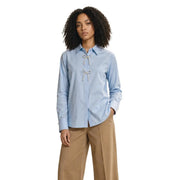 Only women light blue cotton long polo shirt with pearl detail featuring decorative white bow at the front