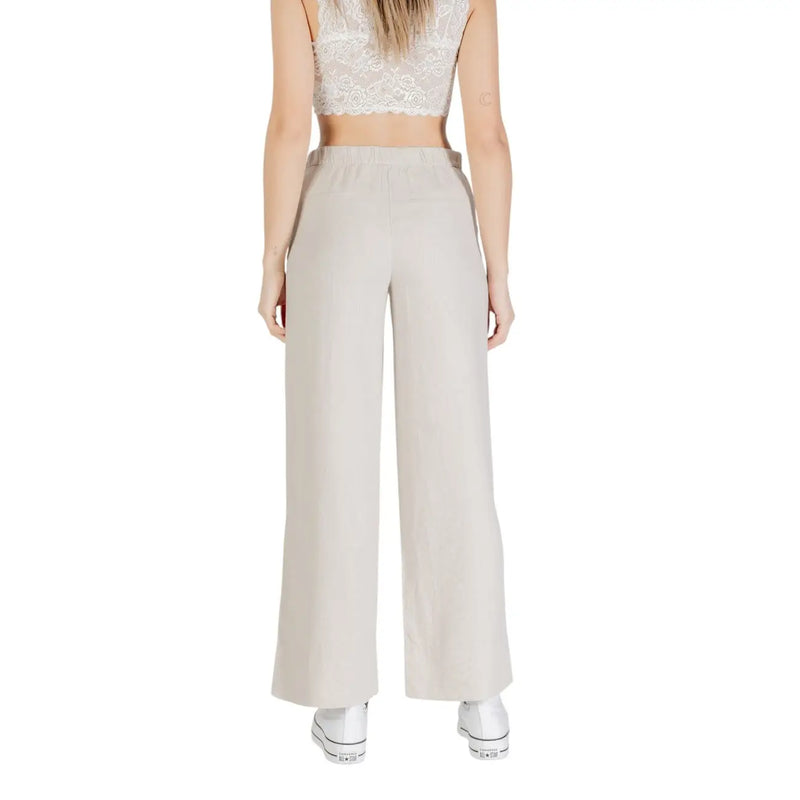 Beige high-waisted wide-leg linen blend trousers by Only women with smooth fabric and elastic waistband
