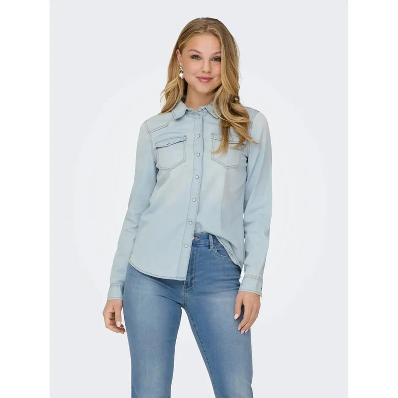 Light blue cotton long button-up shirt for women with two chest pockets and a collar by Only article 15315185