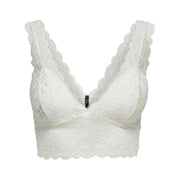 White lace bra with delicate floral patterns and scalloped edges paired with only women sleeveless v neck black polyester top