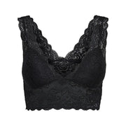 Black lace bra with intricate floral patterns and scalloped edges paired with only women sleeveless black polyester top
