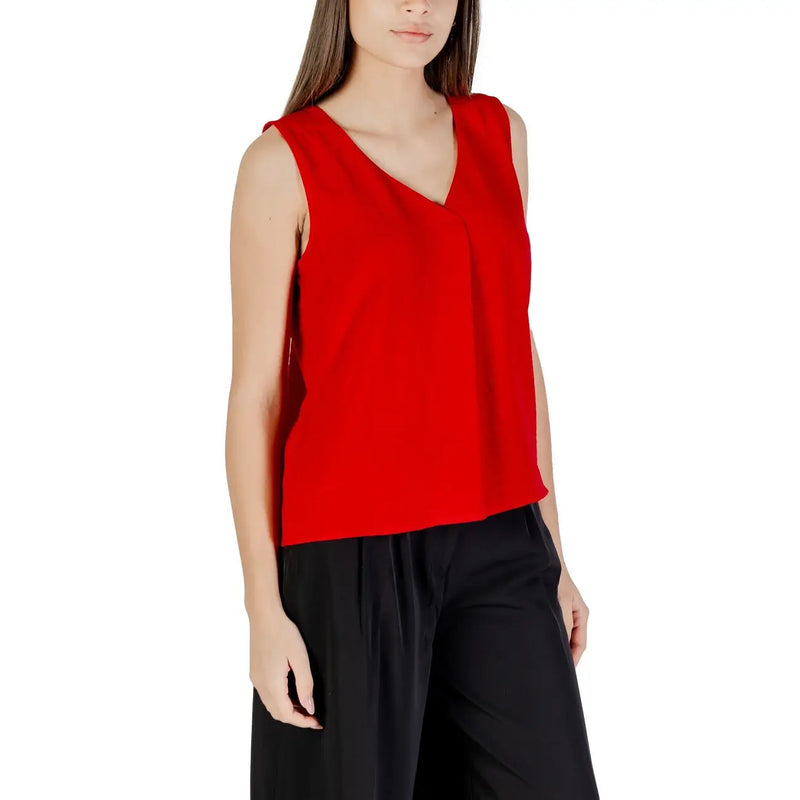 A vibrant red only women tank top with v neckline sleeveless design made of soft flowing polyester fabric
