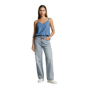 Light-wash denim jeans with straight-leg cut and classic stitching paired with only women tank top v neck blue cotton singlet wvn