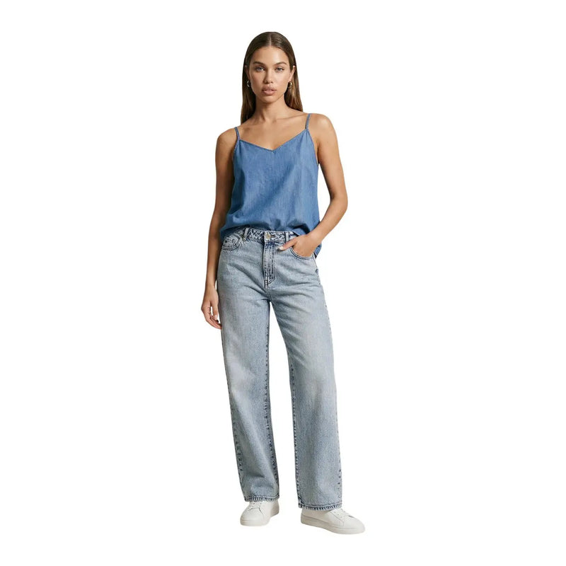 Light-wash denim jeans with straight-leg cut and classic stitching paired with only women tank top v neck blue cotton singlet wvn