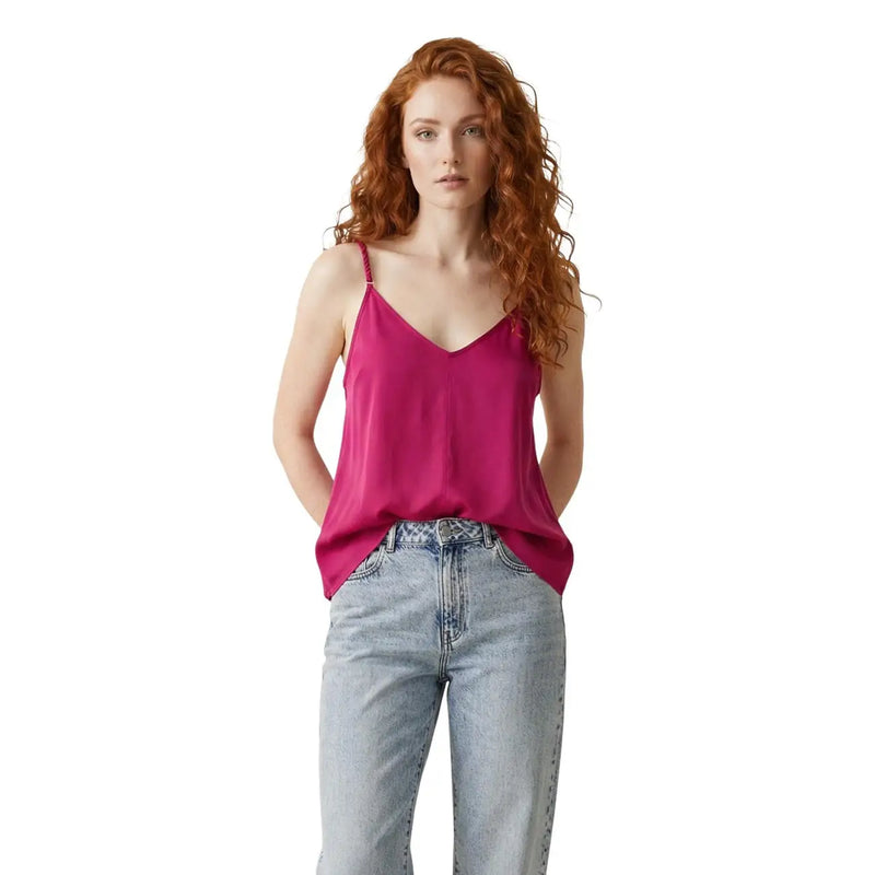 A vibrant fuchsia satin camisole with thin straps and v-neckline made of viscose blend by Only Women