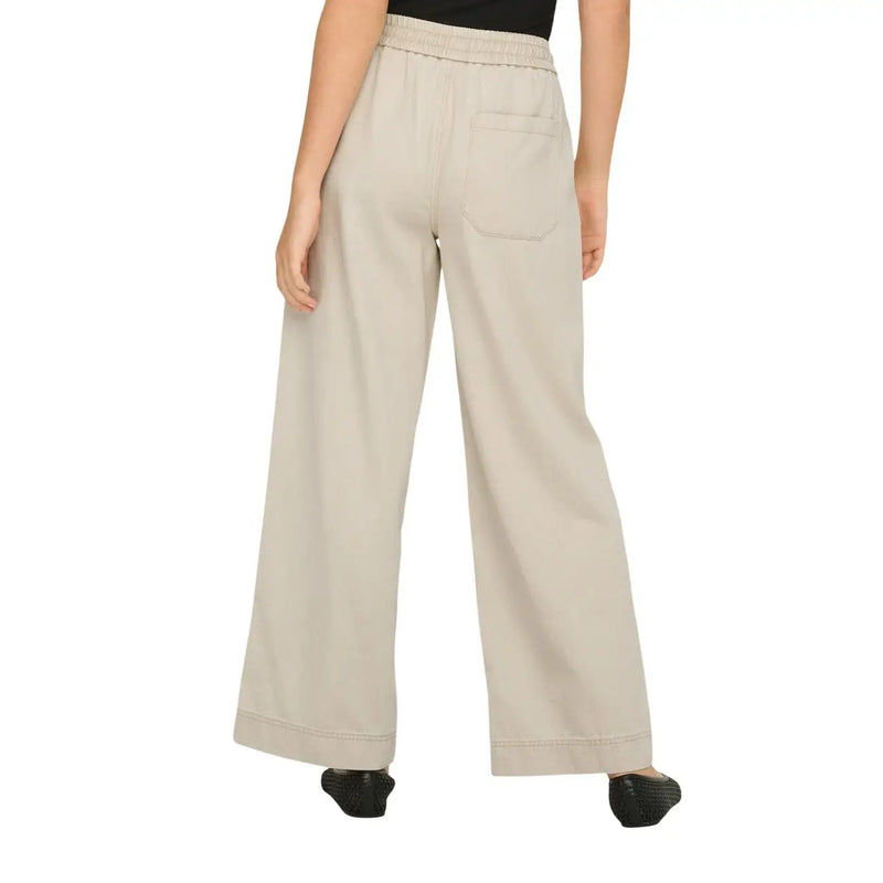 Back side of only women beige cotton lyocell wide-leg trousers with elastic waistband and single back pocket