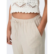 Only women trousers beige linen viscose with a relaxed fit and subtle texture for spring summer wear