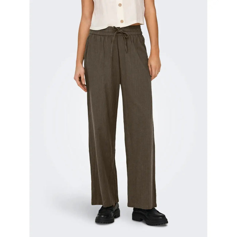 Olive green wide-leg trousers with drawstring waistband paired with only women black cotton lace detail trousers