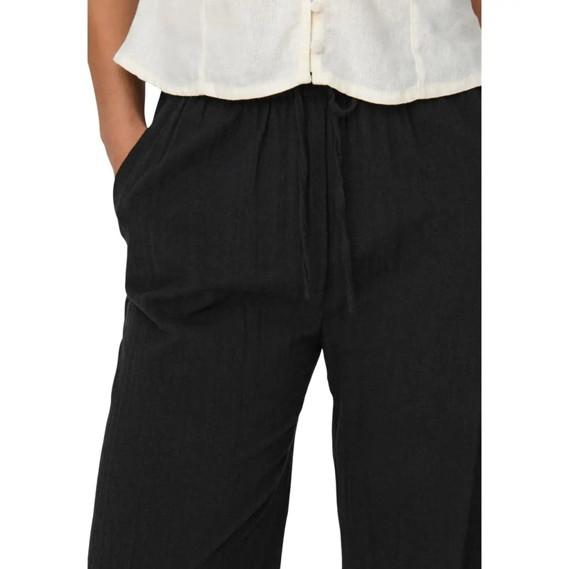 Only Women black cotton trousers with lace detail featuring relaxed fit and subtle vertical pleats