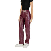 High-waisted burgundy faux leather trousers with glossy finish five-pocket design and zip button closure