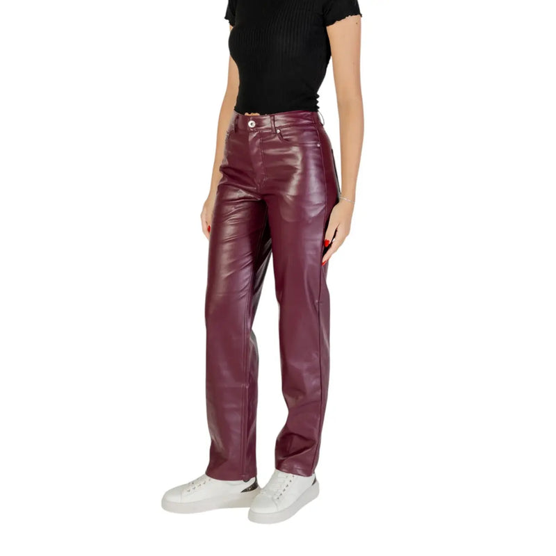 High-waisted burgundy faux leather trousers with glossy finish five-pocket design and zip button closure