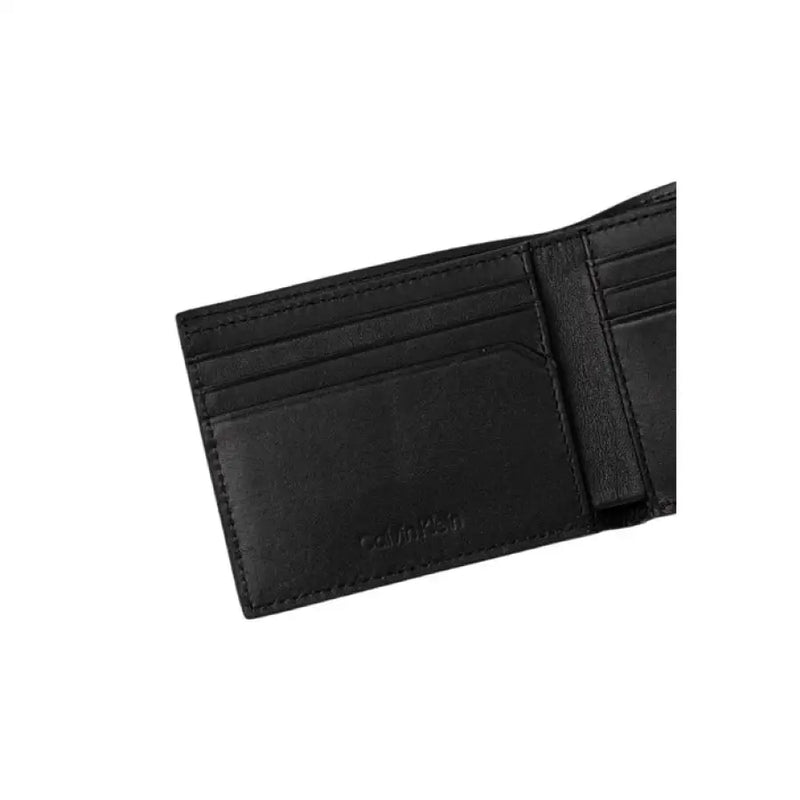 Open black leather wallet displaying CK pattern for stylish organization