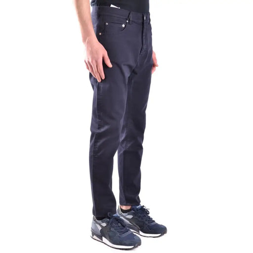 Men’s dark blue slim-fit cotton stretch trousers paired with sneakers from Paolo Pecora