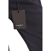 Black textured fabric paolo pecora men trousers with matte black paolo pecora milano brand tag visible