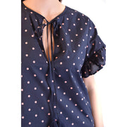 Navy blue silk blouse with pink polka dots and ruffled short sleeves by Parosh women designer fashion top