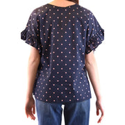 Navy blue short-sleeved silk blouse with pink polka dots and ruffled cuffs by Parosh women designer fashion top